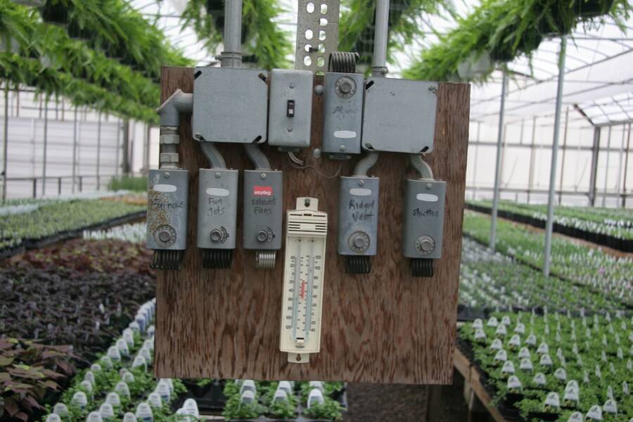 Photo of air temperature sensor in a greenhouse.