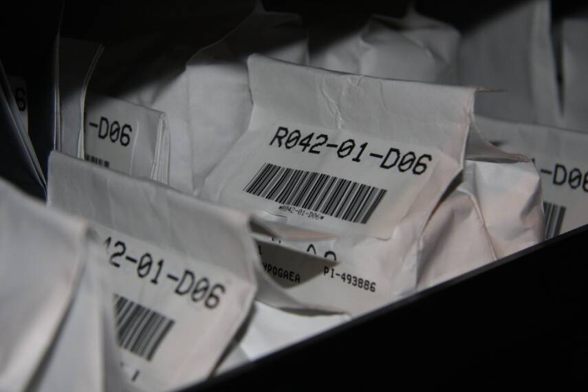 Close up of packages showing the bar code identification of the accession.
