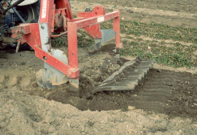 Detail photo of the modified potato digger machinery.